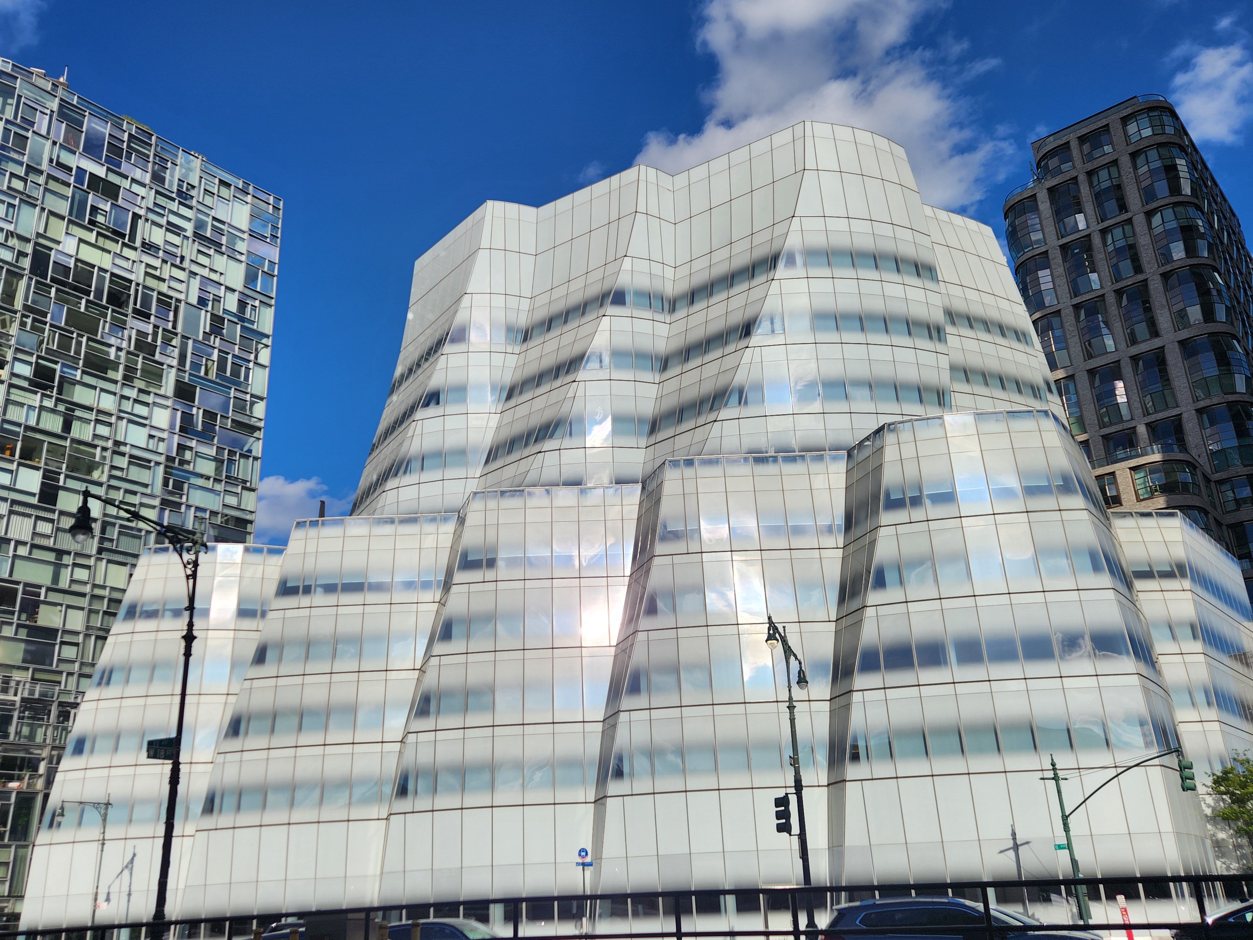 The IAC Building: The Iceberg, the Sail, or the Ice Cube? 1 citybeautifulblog.com the iac building the iceberg the sail or the ice cube 20240908 170020